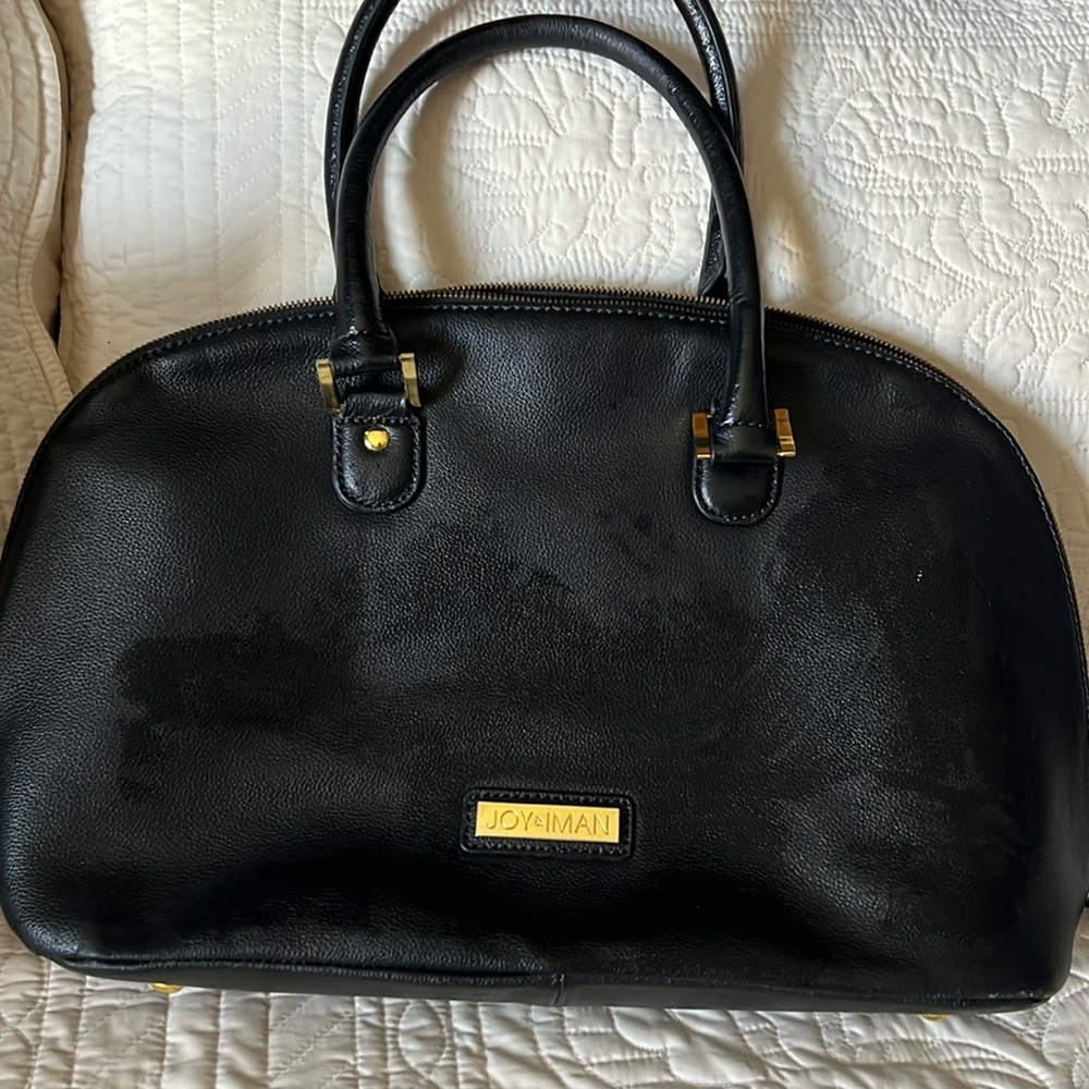Joy and Iman purse see measurements above , small wear inside on pocket
